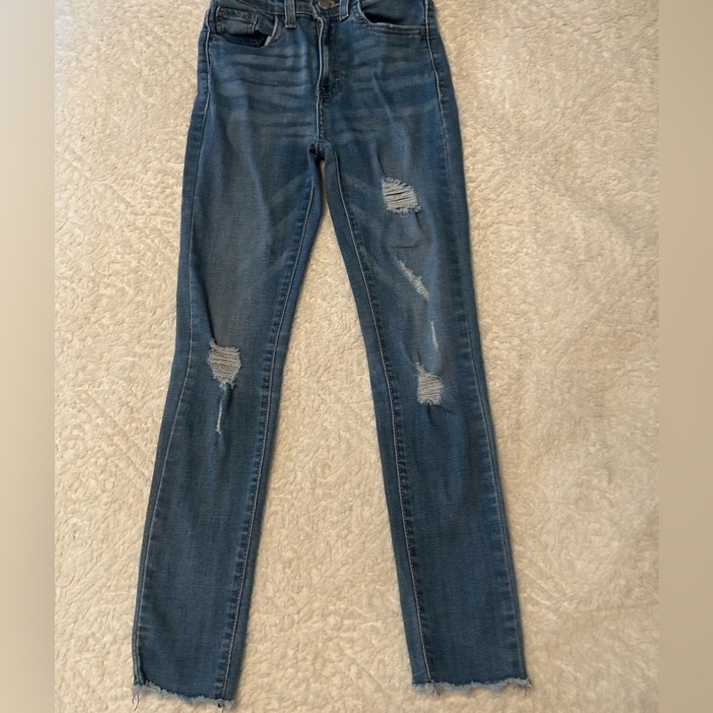 Distressed Blue Jeans